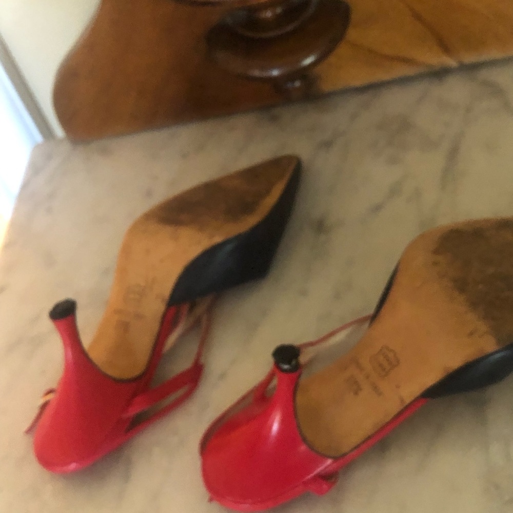 Leather in perfect condition like new.  Needs tiny black rubber tips on heels.